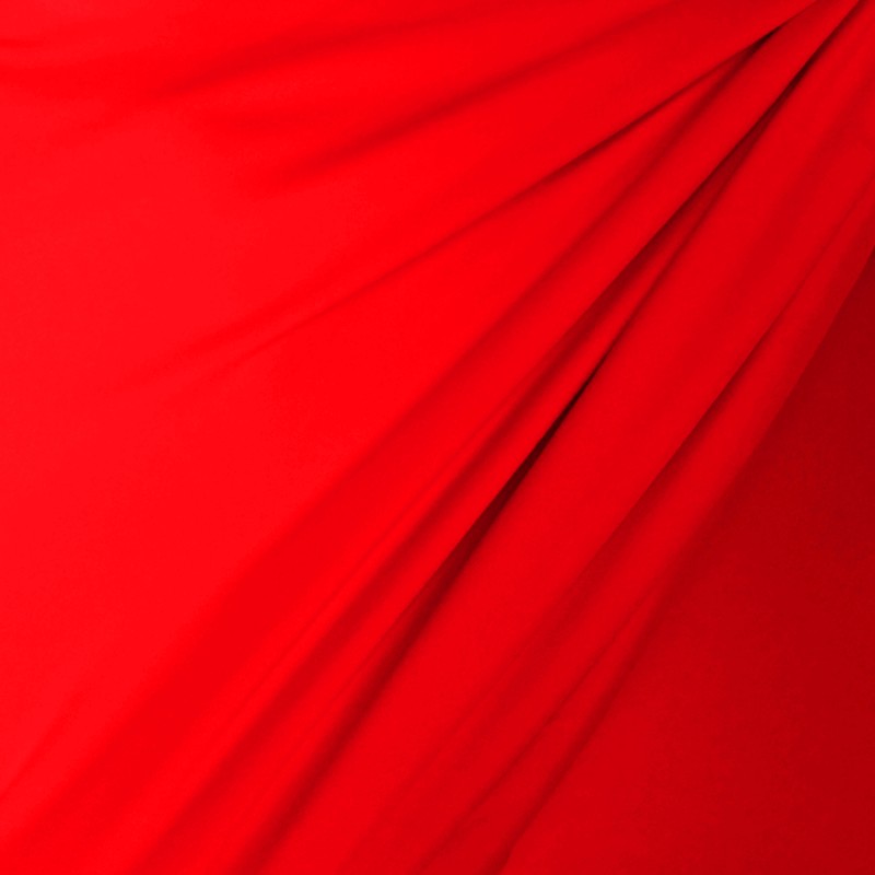 Lycra mate color rojo fluorescente en venta por rollo