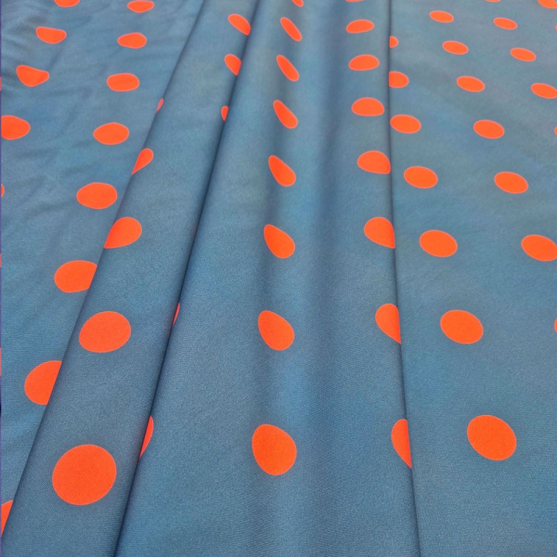 Tela lunares flamencos base azul acero con lunares salmon
