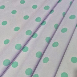 Tela lunares flamencos base lavanda con lunares verdes